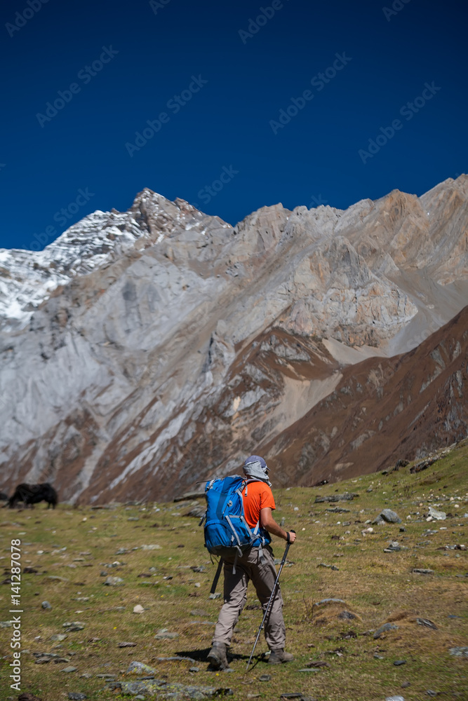 Trekker on Manaslu circuit trek in Nepal Trekker on Manaslu circuit trek in Nepal