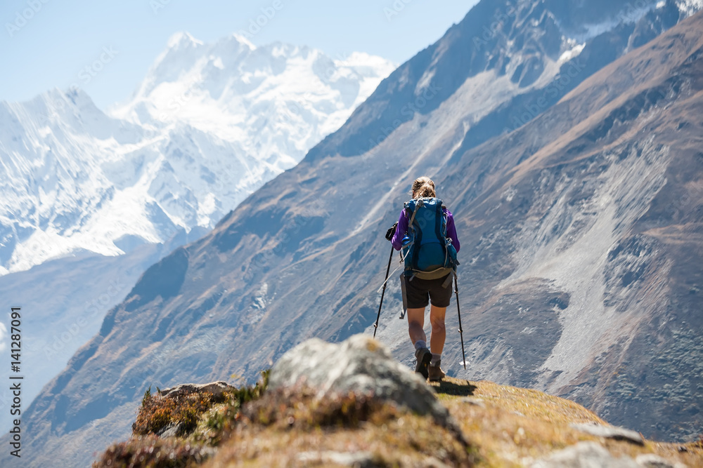 Trekker on Manaslu circuit trek in Nepal Trekker on Manaslu circuit trek in Nepal