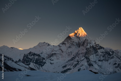 Amadablam peak at sunset in Khumbu valley in Nepal, Himalayas photo