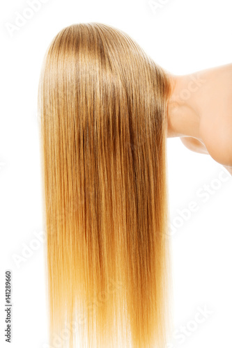 Beautiful long blonde hair, isolated on white.