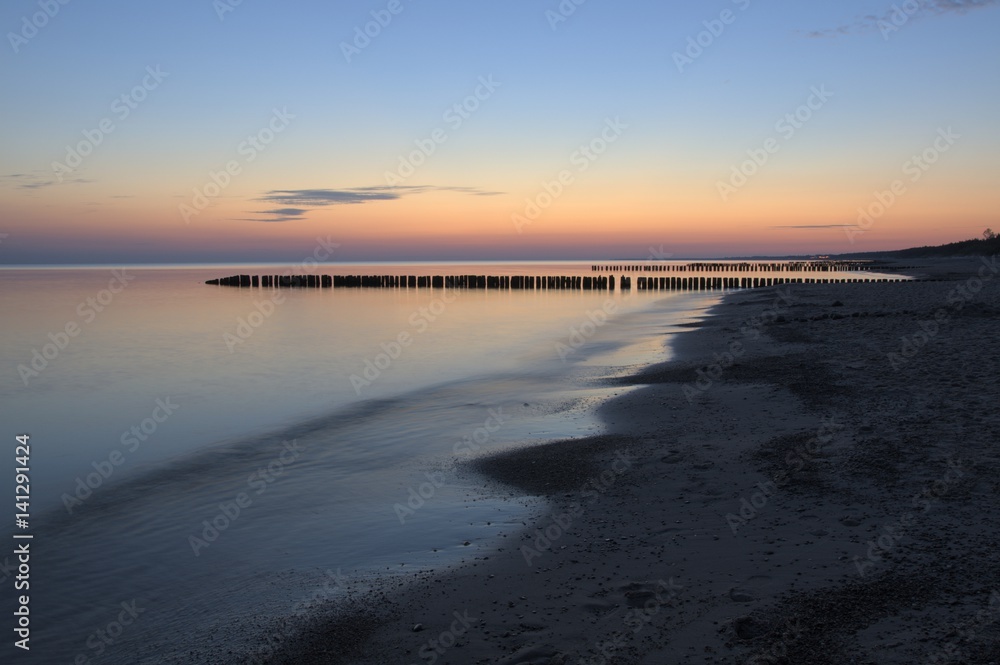 Sunrise. Chlopy (Peasants) - Polish city. Polish Baltic Sea in 2013