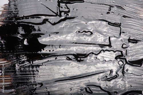 Liquid bitumen surface for backgrounds, textures photo
