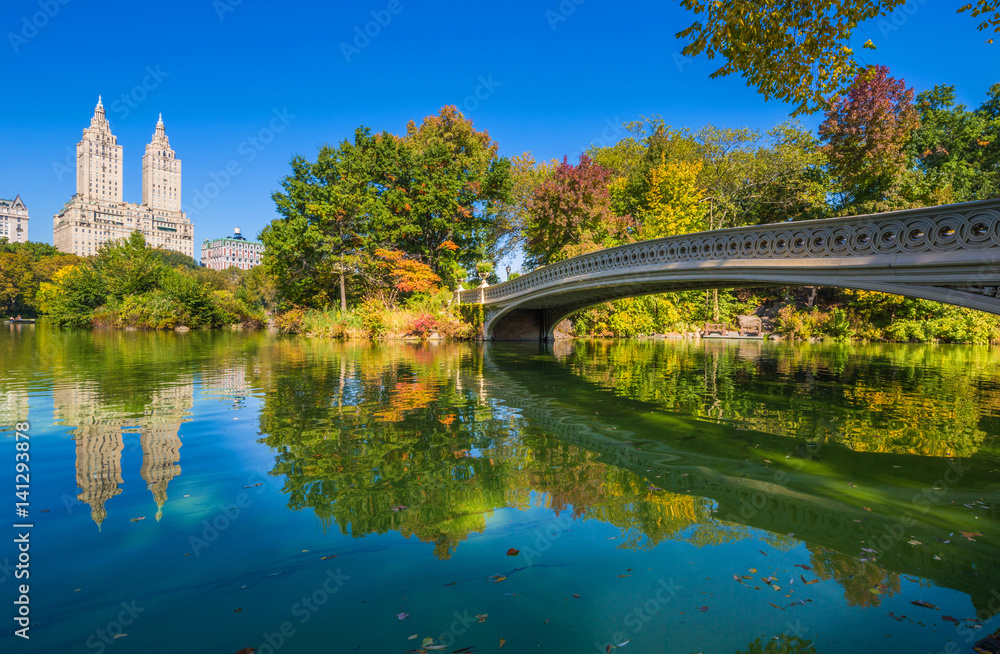Bow bridge in Central park at Autumn sunny day, New York City