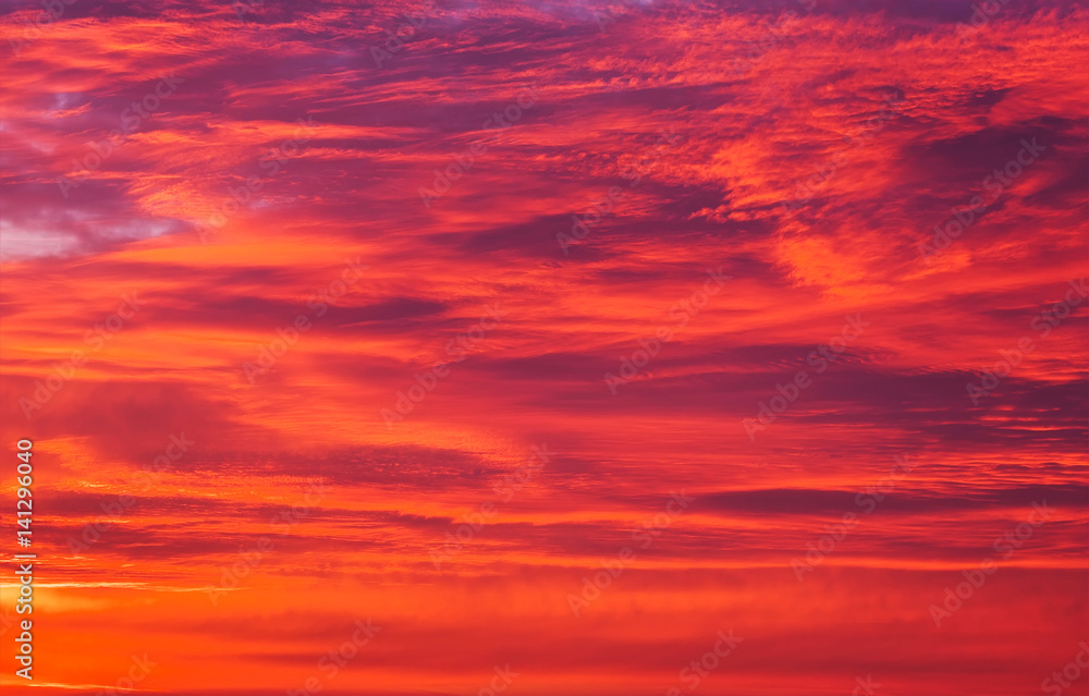 Beautiful fiery orange sky during sunset or sunrise.