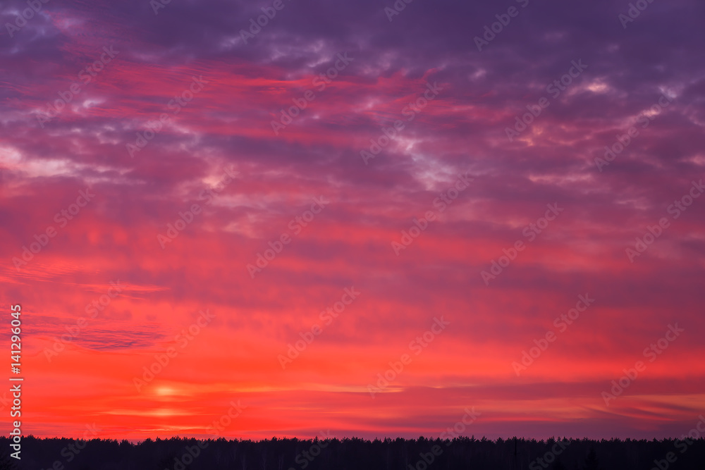 Beautiful fiery orange sky during sunset or sunrise. Beautiful fiery orange sky during sunset or sunrise.