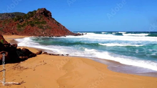 Menorca, Cala Pilar, waves playing with the empty beach