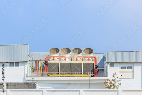 Canvastavla Industrial cooling towers or air cooled chillers on new building factory rooftop