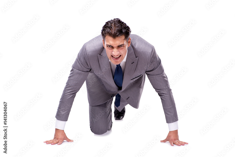 Businessman on start ready for running isolated on white Businessman on start ready for running isolated on white