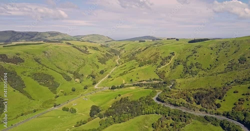 Aerial view of Green hills and valleys of the South Island, New Zealand Aerial view of Green hills and valleys of the South Island, New Zealand