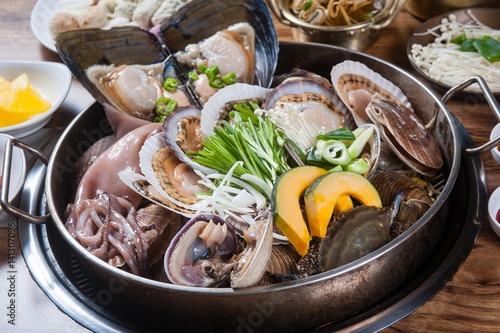 Steamed Clam. This cuisine is Korean style.