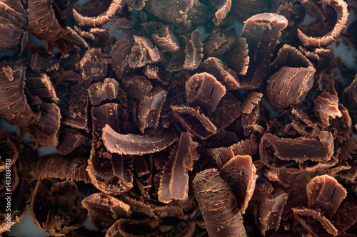 Abstract background of grated dark chocolate