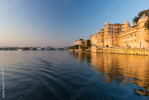 Wallpaper Mural Udaipur cityscape at sunset. The majestic city palace on Lake Pichola, travel destination in Rajasthan, India Torontodigital.ca