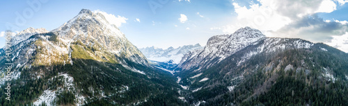 Alpine mountain with panorama view into a valley. Shot with a drone in the Karwendel mountain range 