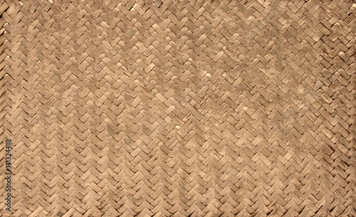 Textur Hintergrund - Flechtwerk Korb geflochten / Rattan - Gold Bronze Farbe photo