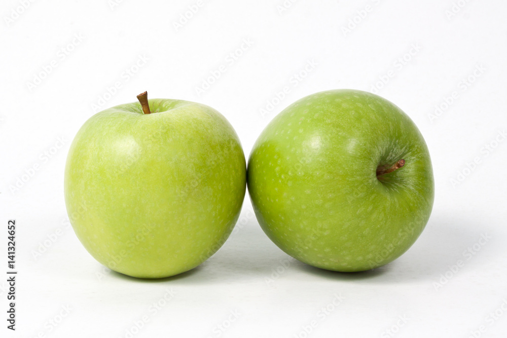 Sliced green apple isolated on white background
