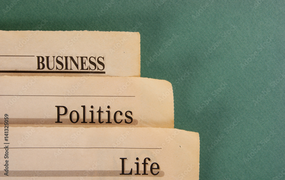 Obraz premium old newspaper on a green background