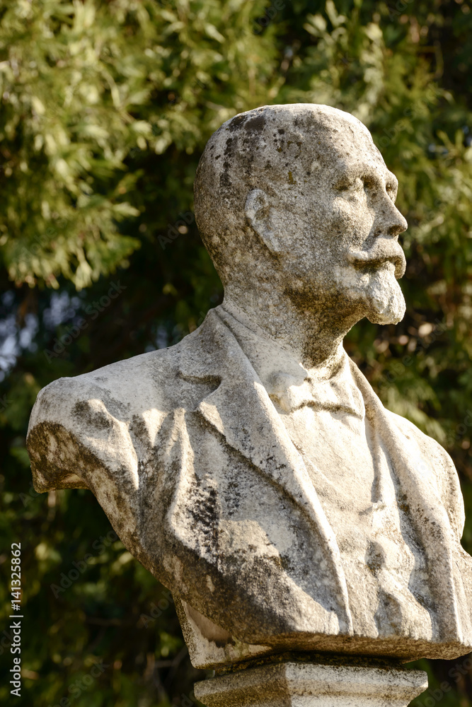 man bust of smoothened stone  at Monumental Cemetery, Milan
