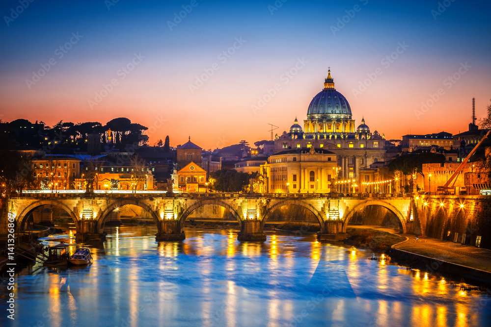 Night view of St. Peter's cathedral and Tiber river in Rome, Italy