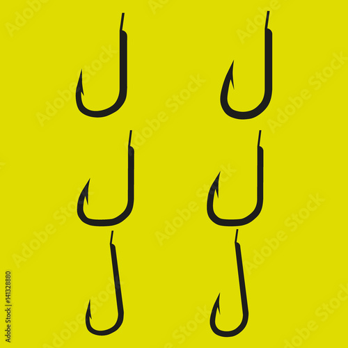 set of fishing hooks of different shapes on a yellow background