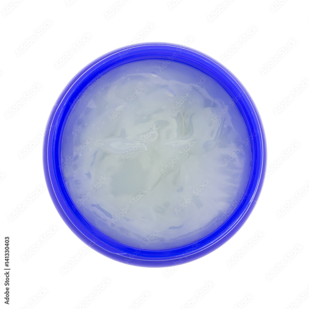 Top view of an opened container of chest rub isolated on a white background. Top view of an opened container of chest rub isolated on a white background.