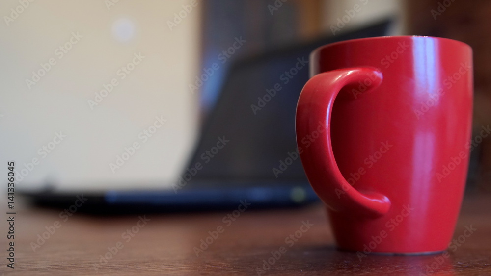 Fototapeta premium Coffee Cup And Laptop At Office