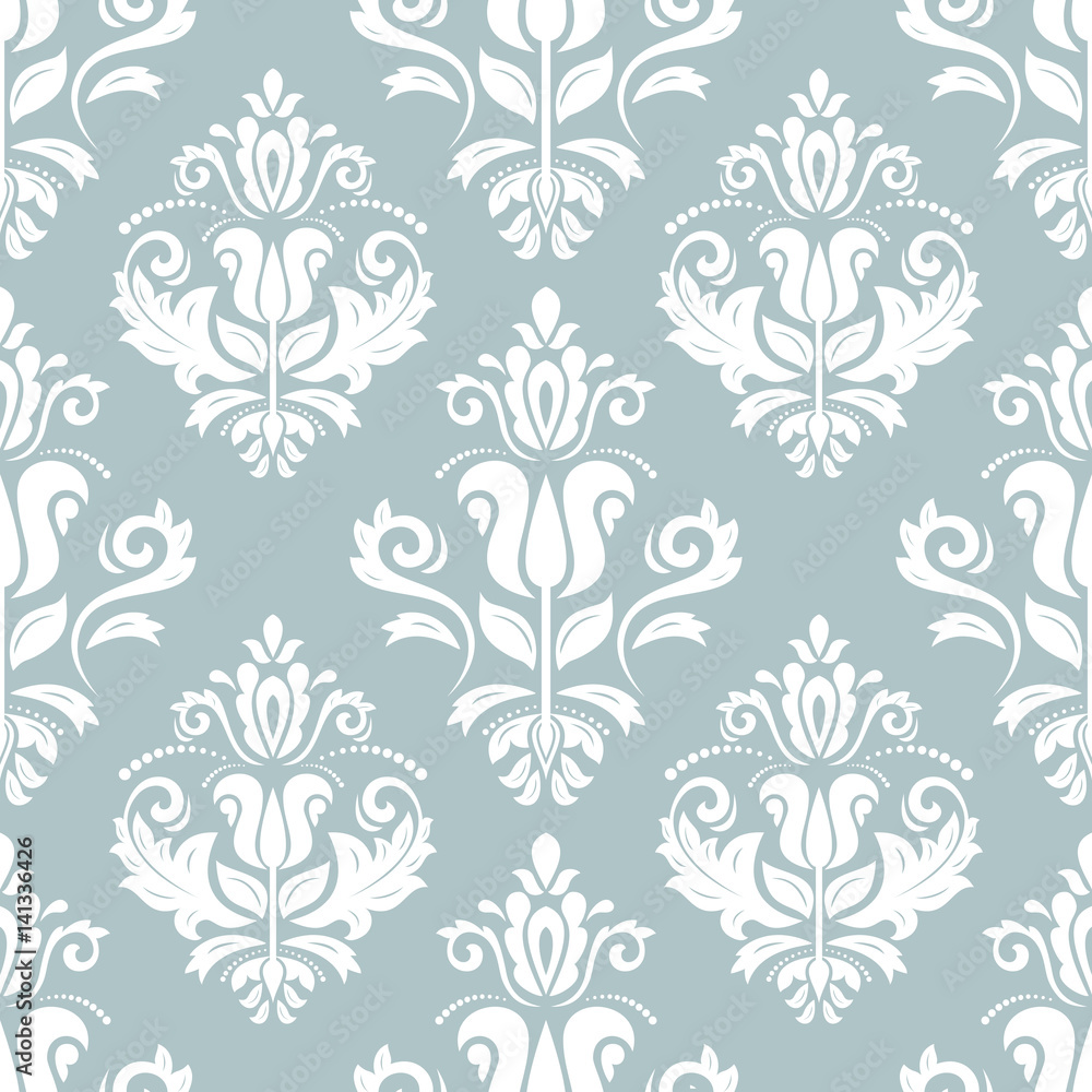 Damask classic light blue and white pattern. Seamless abstract background with repeating elements Damask classic light blue and white pattern. Seamless abstract background with repeating elements