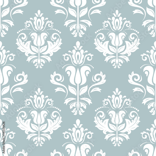 Damask classic light blue and white pattern. Seamless abstract background with repeating elements