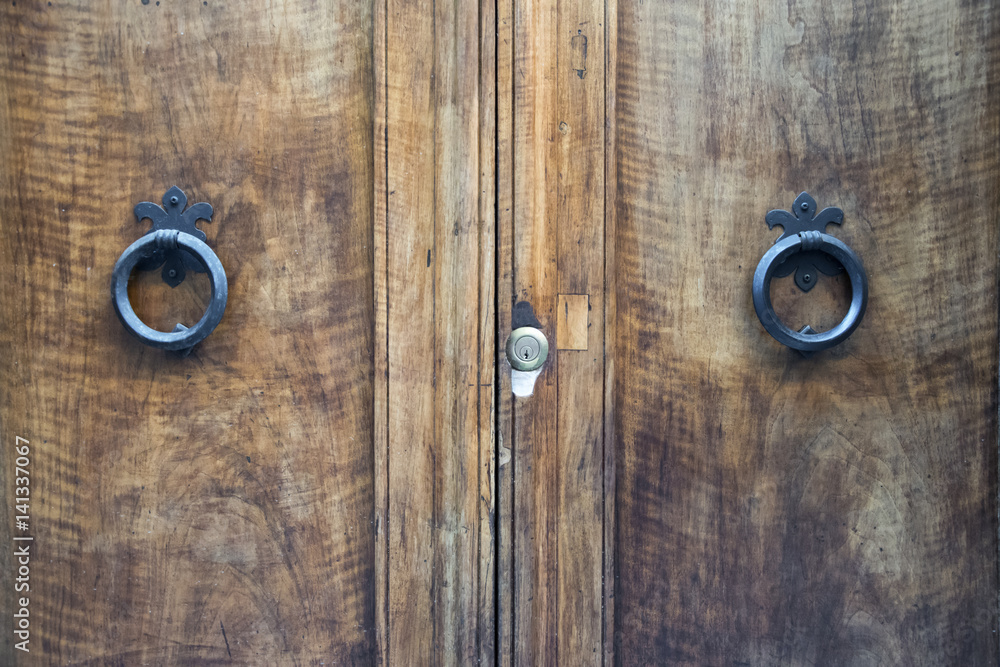 Details of an ancient Italian door. Details of an ancient Italian door.