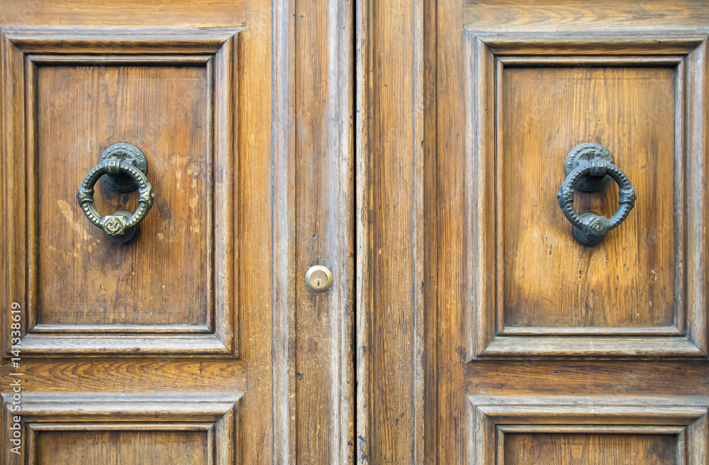Details of an ancient Italian door. Details of an ancient Italian door.