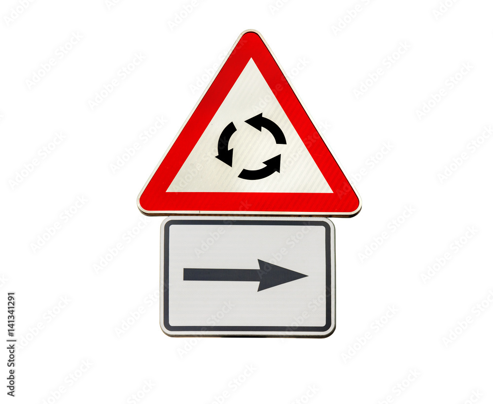 Road sign for right arow and Red roundabout sign Road sign for right arow and Red roundabout sign