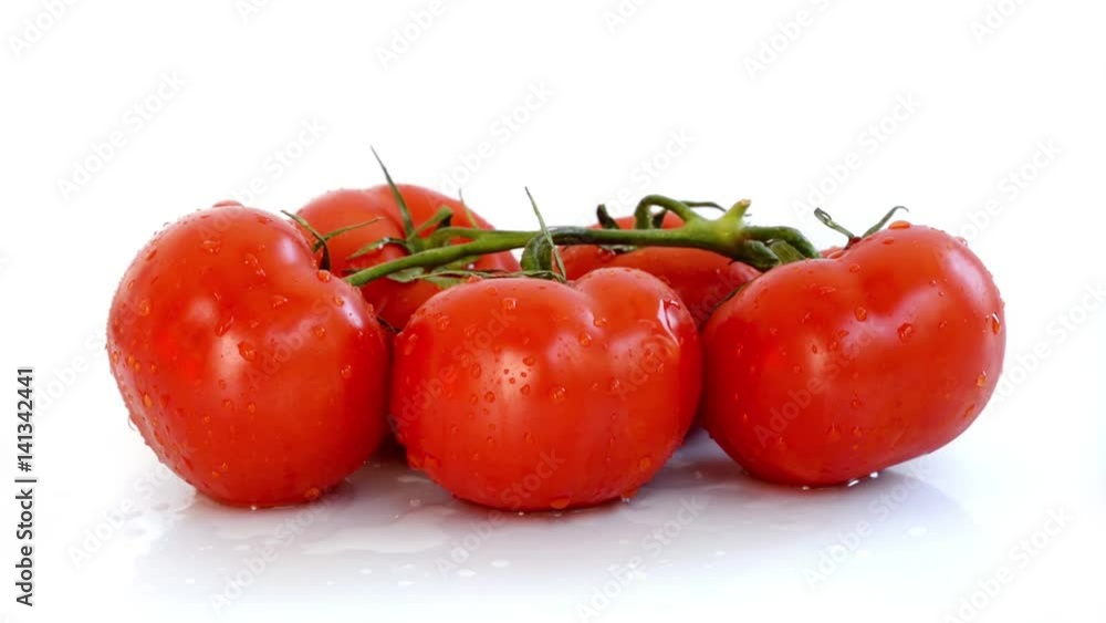 Seamless loop, fresh branch of tomatoes on white background, water trickes, HD video Seamless loop, fresh branch of tomatoes on white background, water trickes, HD video