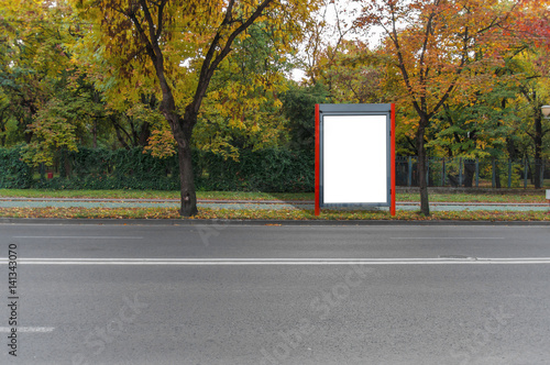Small red blank billboard for media business advert on street