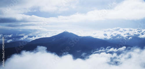 Picturesque view of the mountains that glow under sunlight. © zwiebackesser