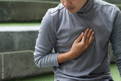 sick man suffering from heart attack, chest pain