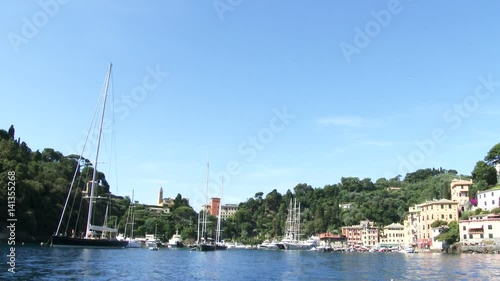 View of the small town of Portofino, one of the most famous historical Itailian town, from the sea. photo