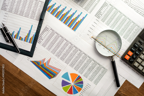 Financial printed paper charts, graphs and diagrams
