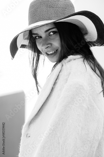 Fotografie Very beautiful student girl poses for a photo in instagram in Europe,Black and w