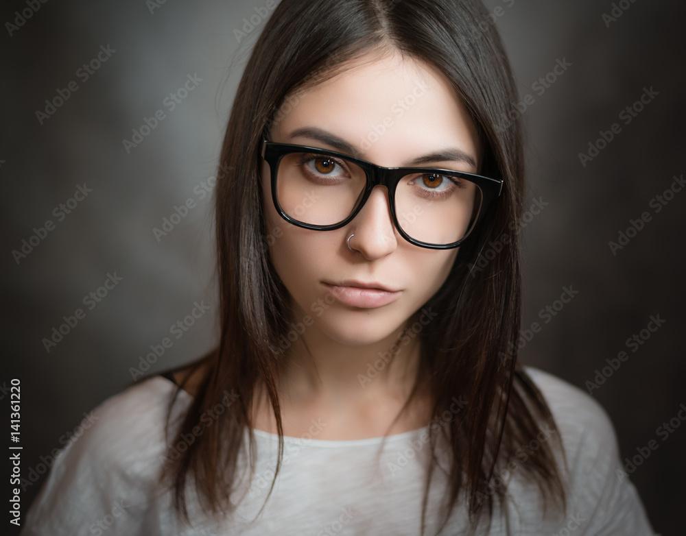 Portrait of woman wearing glasses. Selective focus. Portrait of woman wearing glasses. Selective focus.