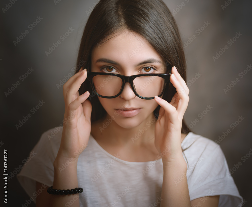 Portrait of woman wearing glasses. Selective focus.