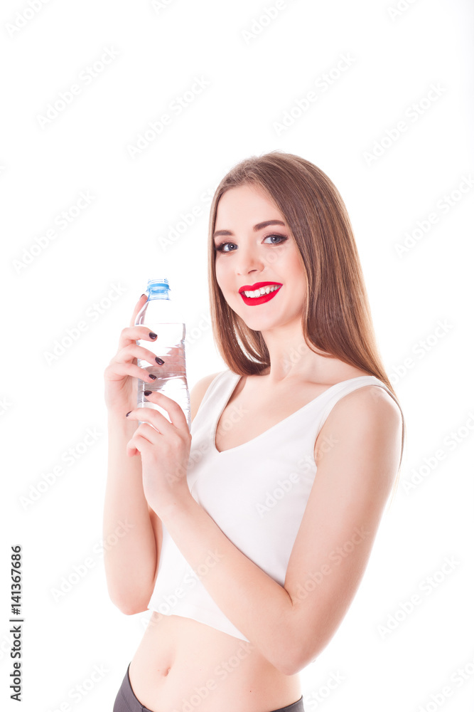 Beautiful natural model, smile, portrait, holding a bottle of water, isolate on a white background Beautiful natural model, smile, portrait, holding a bottle of water, isolate on a white background