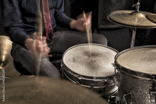 Drummer playing a rhythm, swing