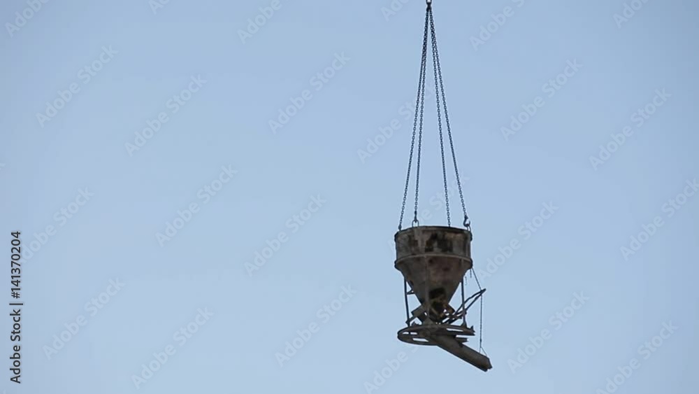 The special pipe for filling of concrete is lifted in air for transportation The special pipe for filling of concrete is lifted in air for transportation