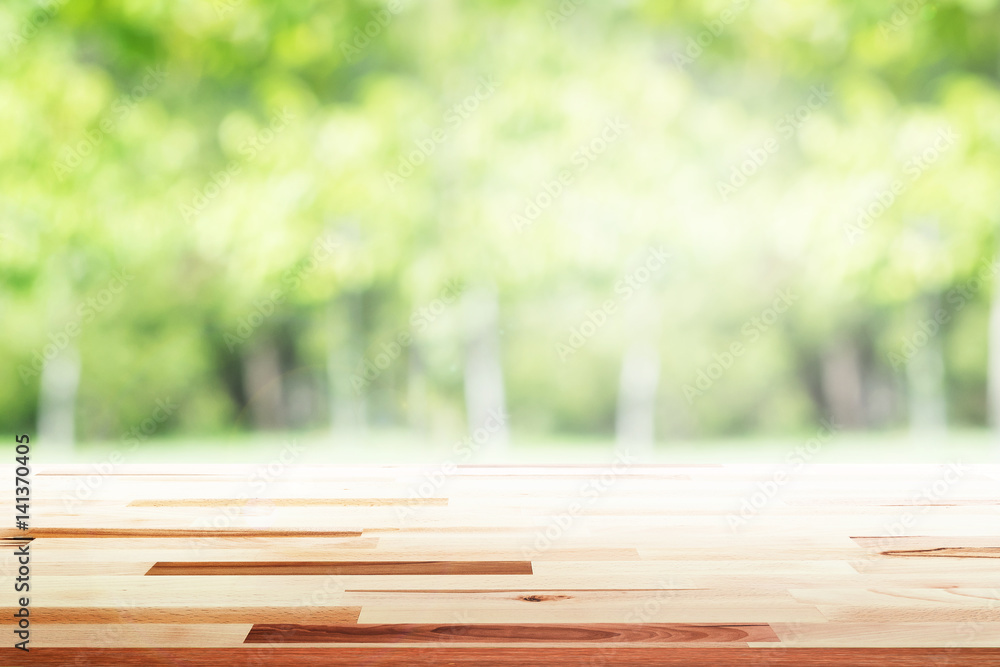 Empty wooden table with party in garden background blurred. Empty wooden table with party in garden background blurred.