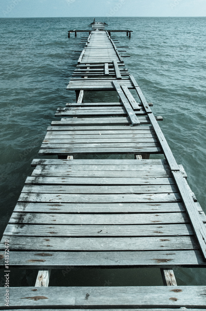 Wooden pier on the sea background Wooden pier on the sea background