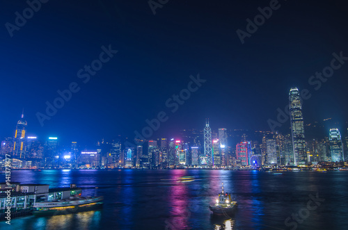 HONG KONG, CHINA - DEC 8, 2016: Hong Kong cityscape waterfront over Victoria harbor, to night on December 8, 2016 in Hong Kong, China