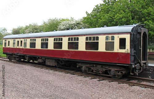 A Vintage Railway Train Carriage Standing at a Platform.