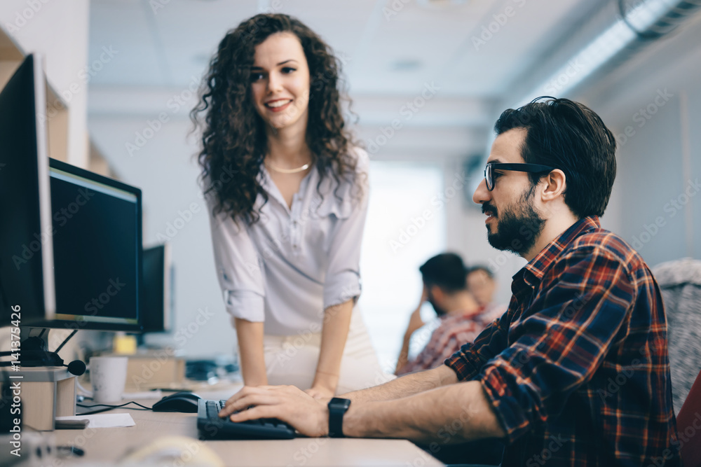 Fototapeta premium Programmers cooperating at information technology company