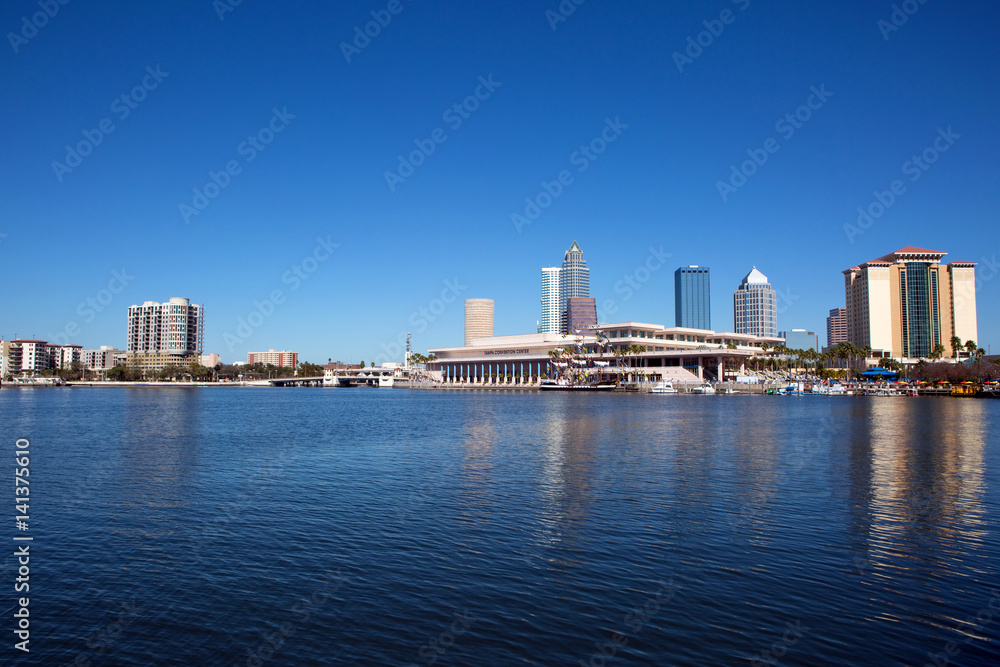View of the Tampa Convention Center and the city skyline from across the Hillsborough River. 