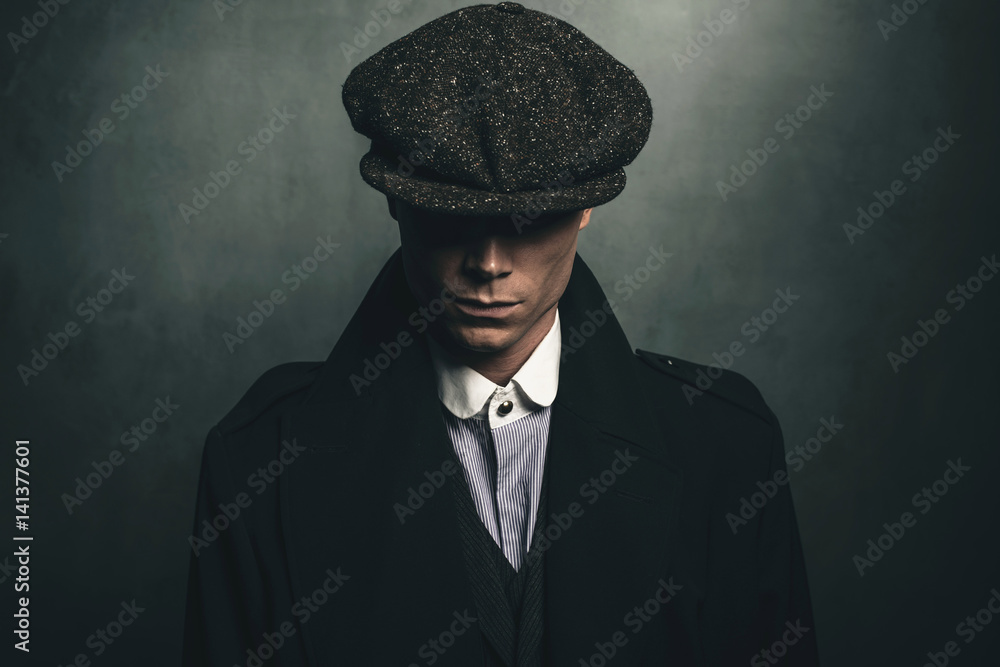Fotografie, Obraz Mysterious portrait of retro 1920s english gangster with  flat cap | Posters.cz