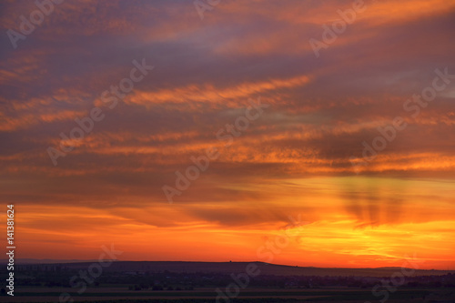Fiery orange sunset sky. Beautiful sky. © brszattila